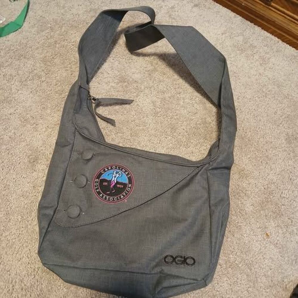 charcoal gray messenger bag featuring a Carolinas Golf Association